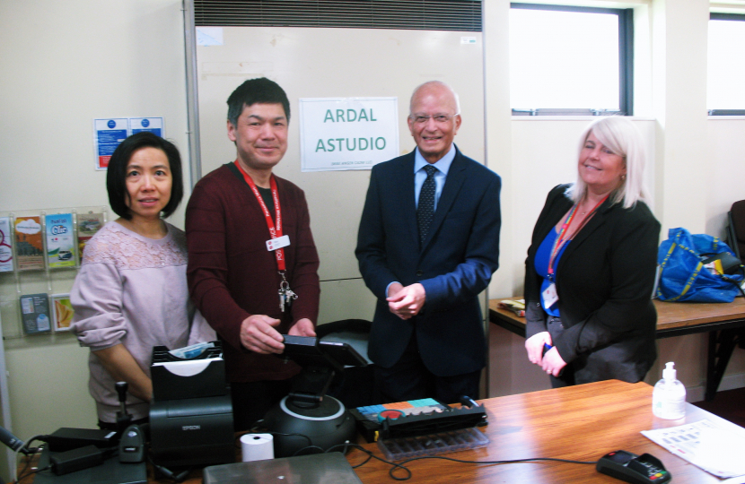 Altaf talking with staff at Aberkenfig post office