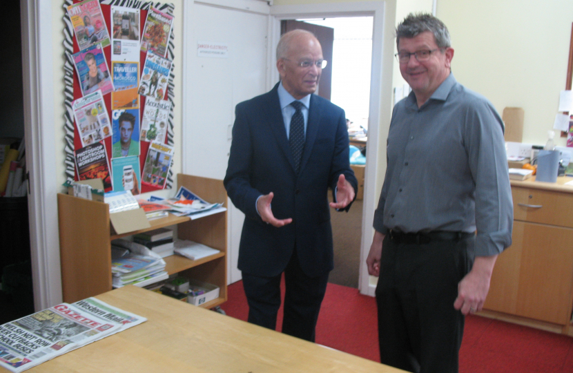 Altaf talking with Dean Tuck, supervisor of Aberkenfig library 