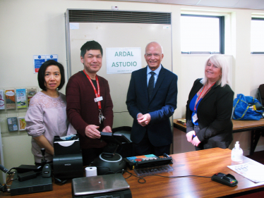 Altaf talking with staff at Aberkenfig post office